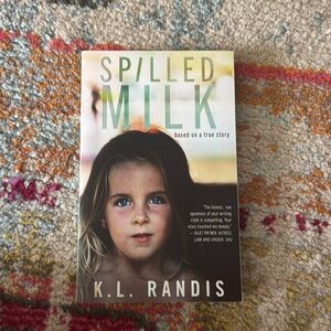 Spilled Milk
K.L. Randis